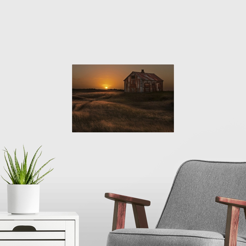 A modern room featuring A rusted abandoned house in a grassy landscape at sunset, Iceland.