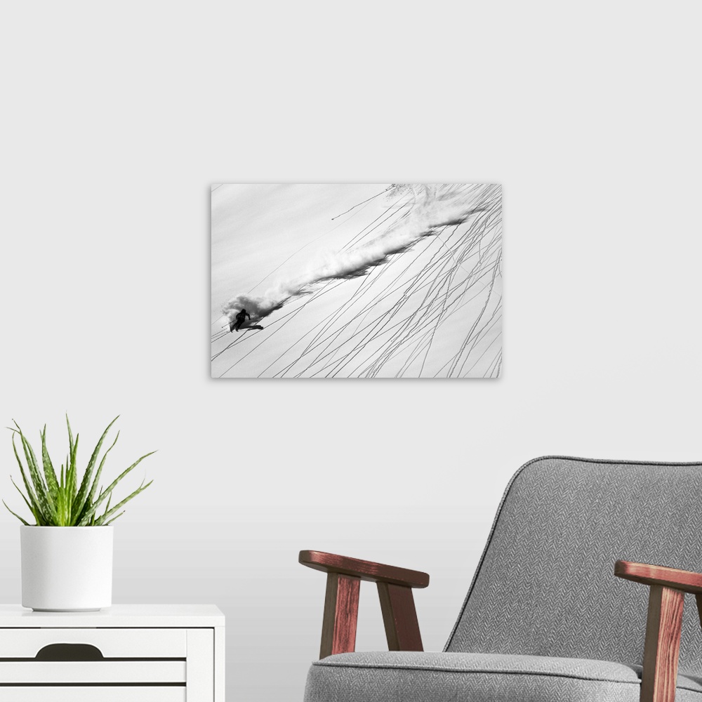 A modern room featuring Skiing down a mountain in the Austrian Alps, past ski tracks.