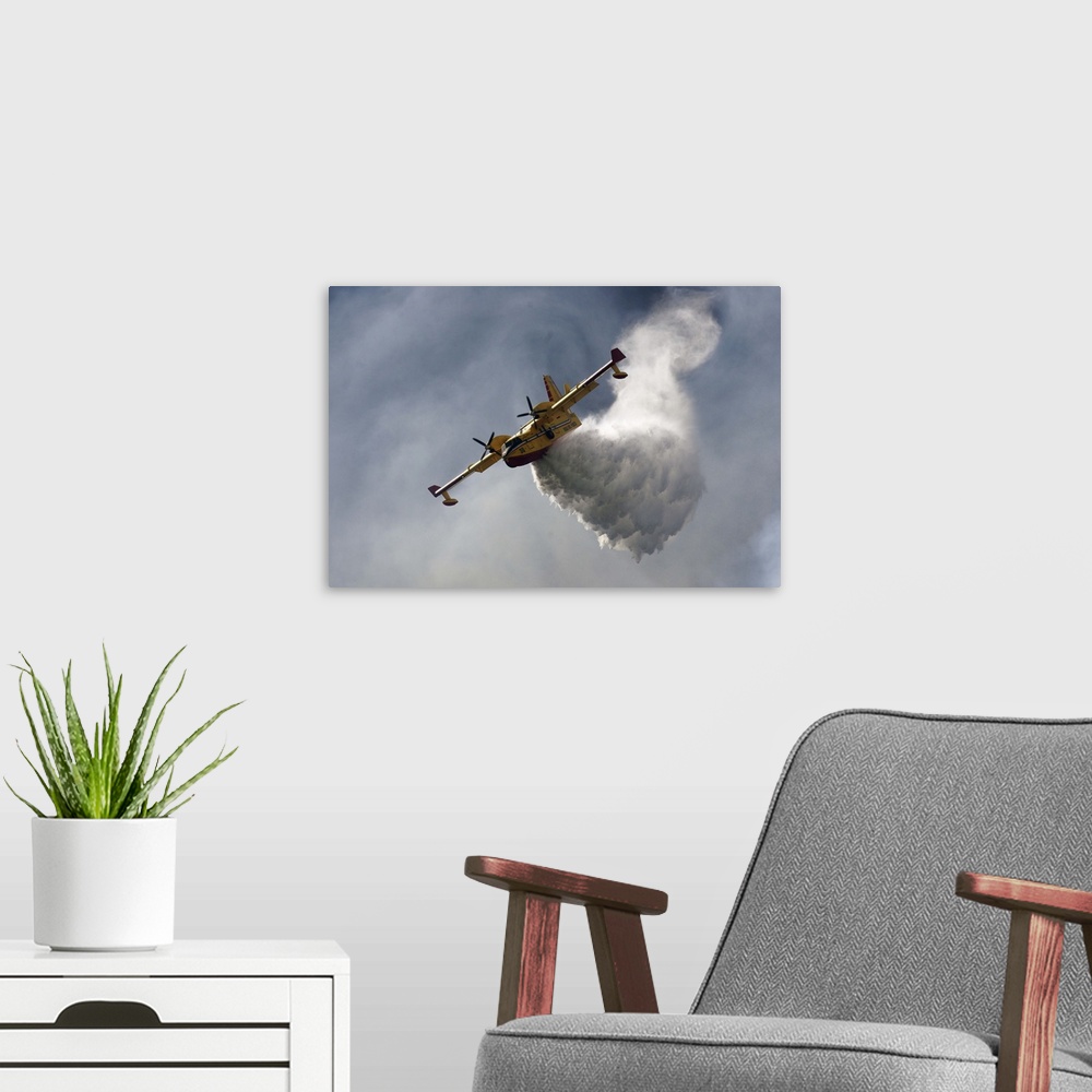A modern room featuring A CanadAir fire plane releasing tons of water in the sky.
