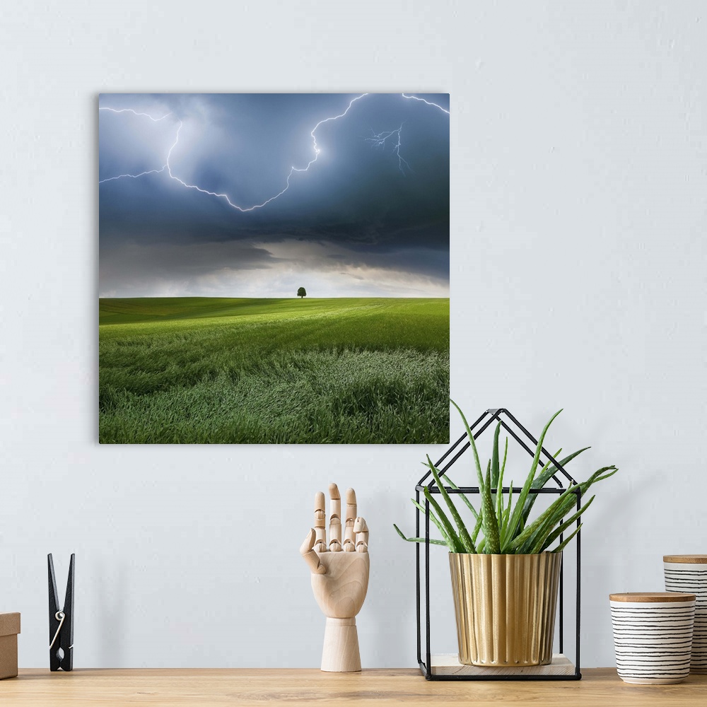 A bohemian room featuring A dark storm cloud with lightning bolts over a field in the Swabian Jura region of Germany.