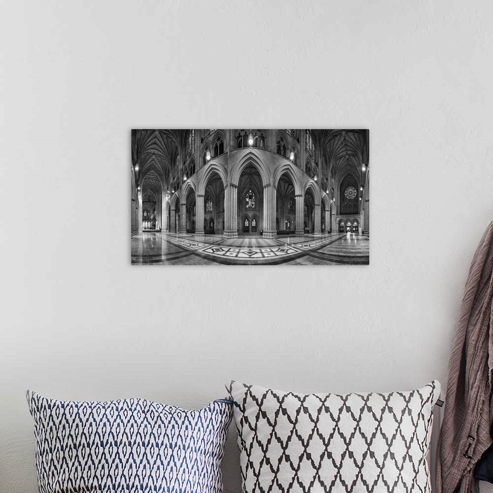 A bohemian room featuring 6-frame panoramic of cathedral nave.