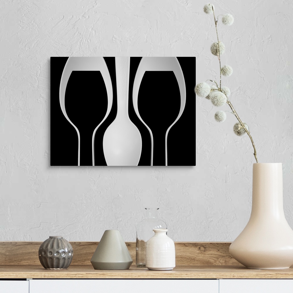 A farmhouse room featuring Abstract image of plastic spoons arranged to resemble wine glasses.