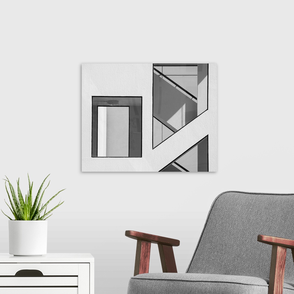 A modern room featuring Stairwell Geometry