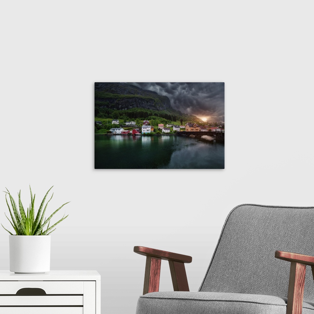 A modern room featuring Storm clouds over the coastal city of Stryn in Norway.