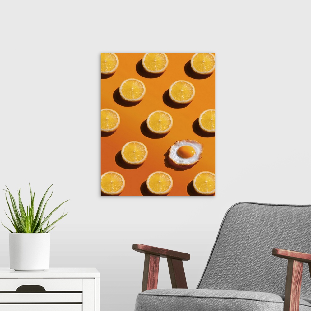 A modern room featuring Lemon slices pattern with a fried egg, yellow background, abstract, surprise concept.