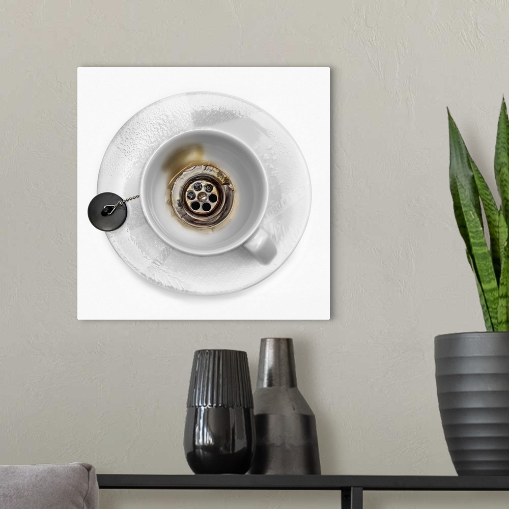 A modern room featuring Conceptual image of a coffee mug with a drain at the bottom.