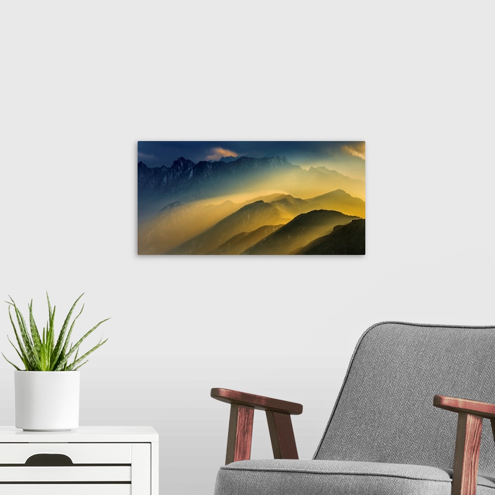 A modern room featuring The Cattle-Back Mountain Sunset