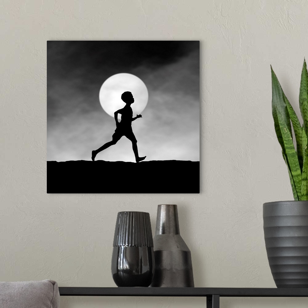 A modern room featuring Silhouette of a boy running at night, in front of the full moon.