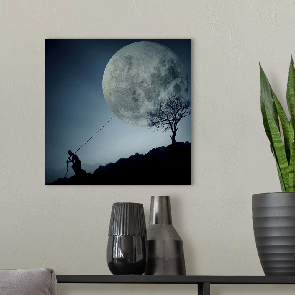 A modern room featuring Conceptual image of a man pulling the moon behind him with a rope, down a hill.