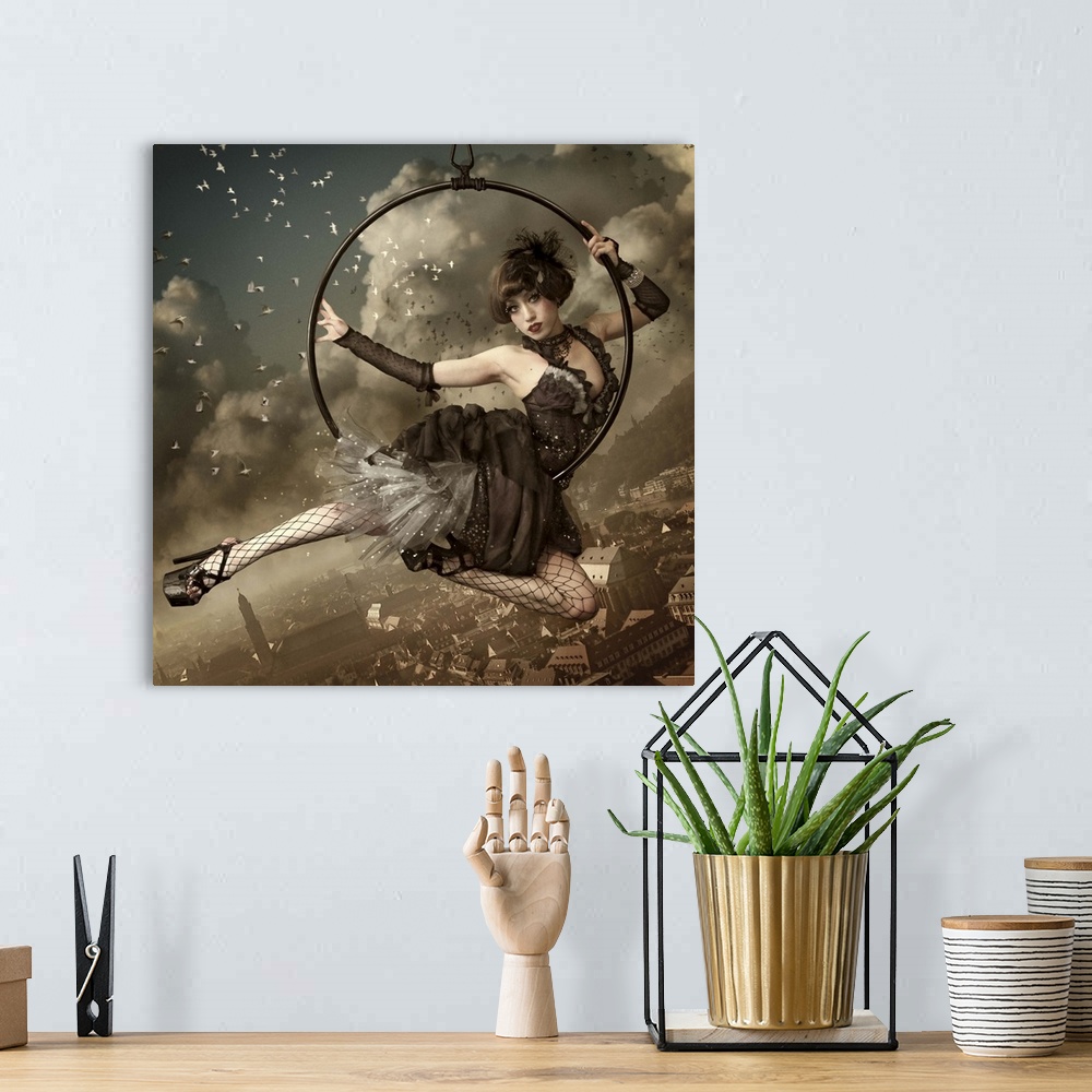 A bohemian room featuring Beautiful performer in a hoop hanging in the sky above a city.