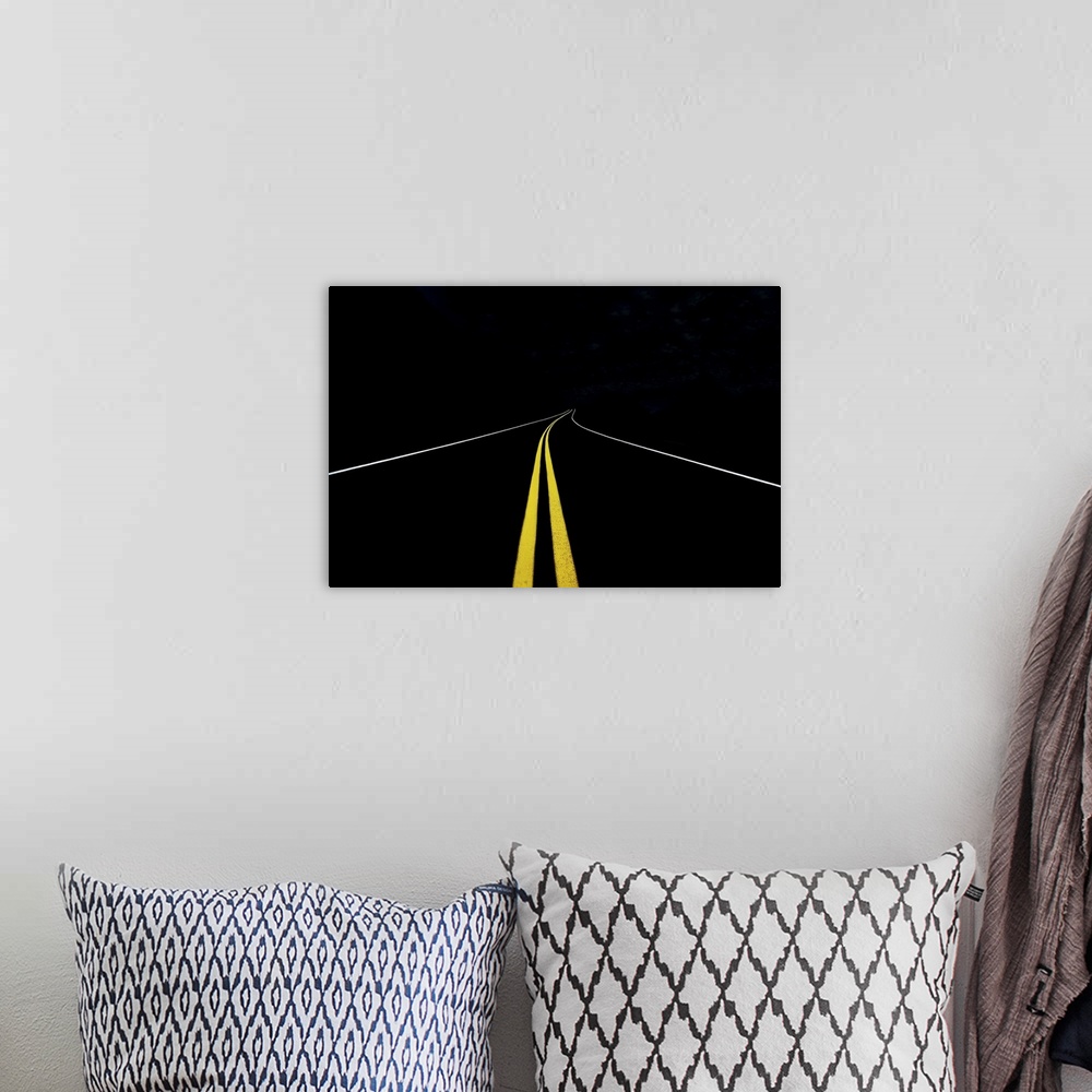 A bohemian room featuring Minimalist image of a road with yellow and white traffic lines.