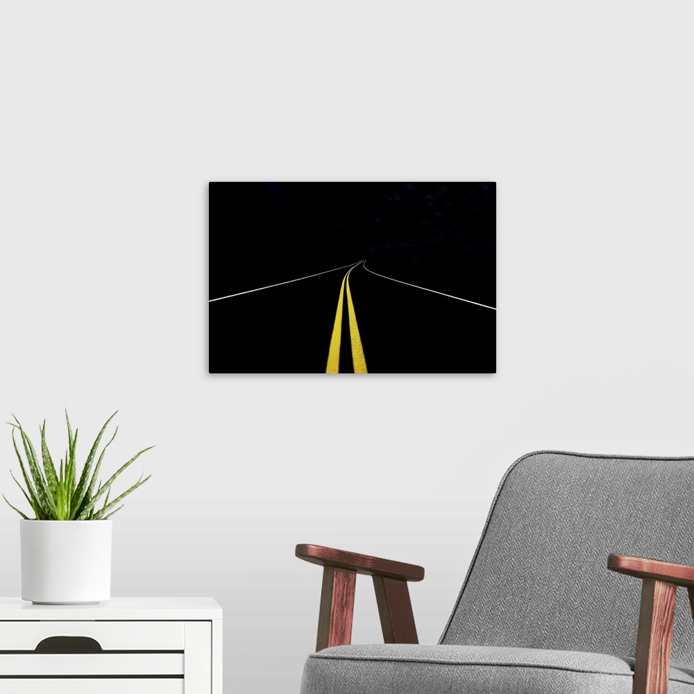 A modern room featuring Minimalist image of a road with yellow and white traffic lines.
