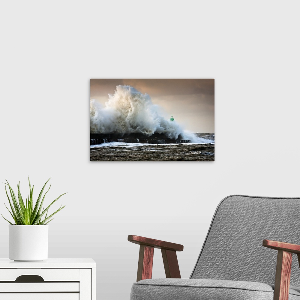 A modern room featuring A huge wave crashes against a pier, sending sprays of water into the air.