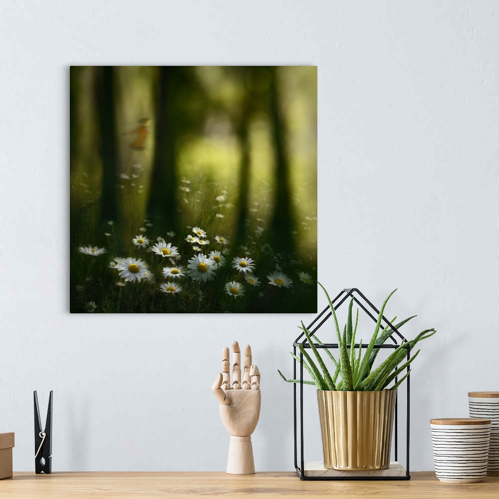 A bohemian room featuring An abstract photograph of  girl frolicking through a flowery forest meadow.