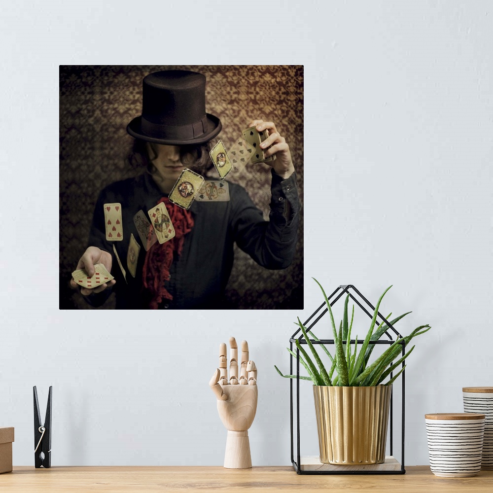 A bohemian room featuring Conceptual image of a magician flipping playing cards in the air.