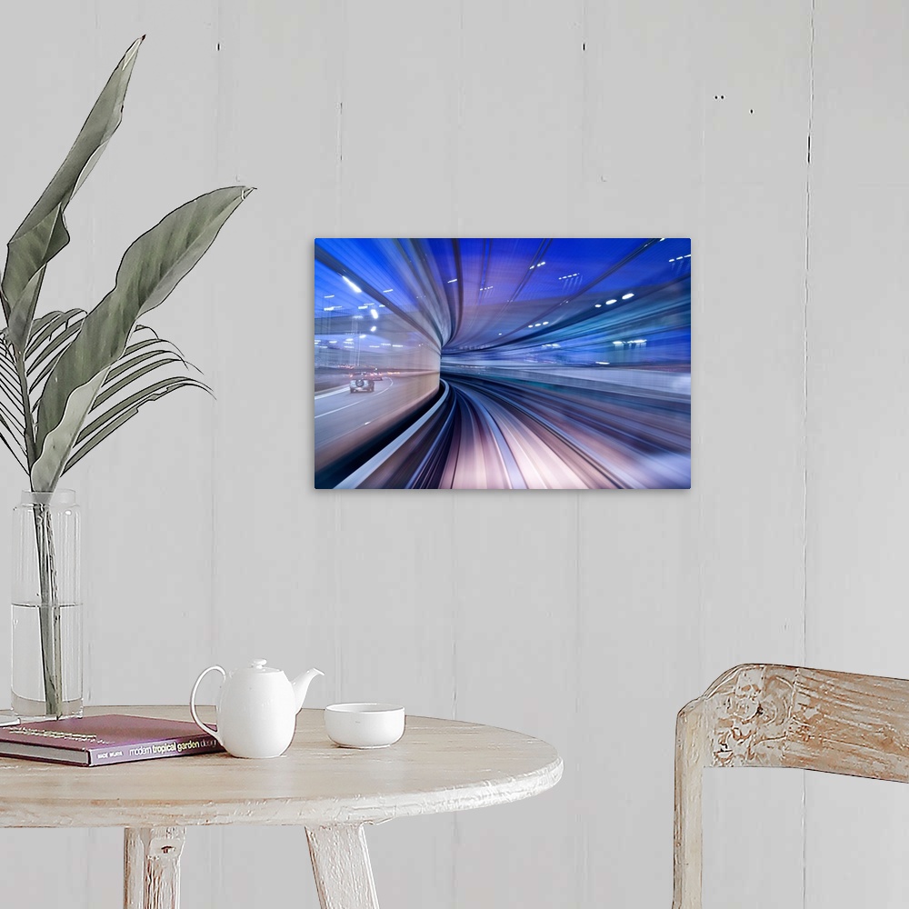 A farmhouse room featuring Blurred motion image of a highway in the evening, creating the illusion of being in a tunnel.