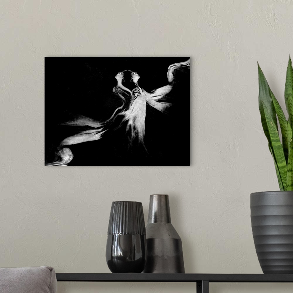 A modern room featuring Two figures back-to-back, their images swirling together.