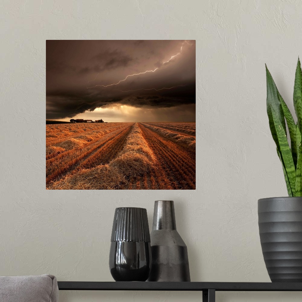 A modern room featuring A countryside farmland under a cloudy lightning filled sky.