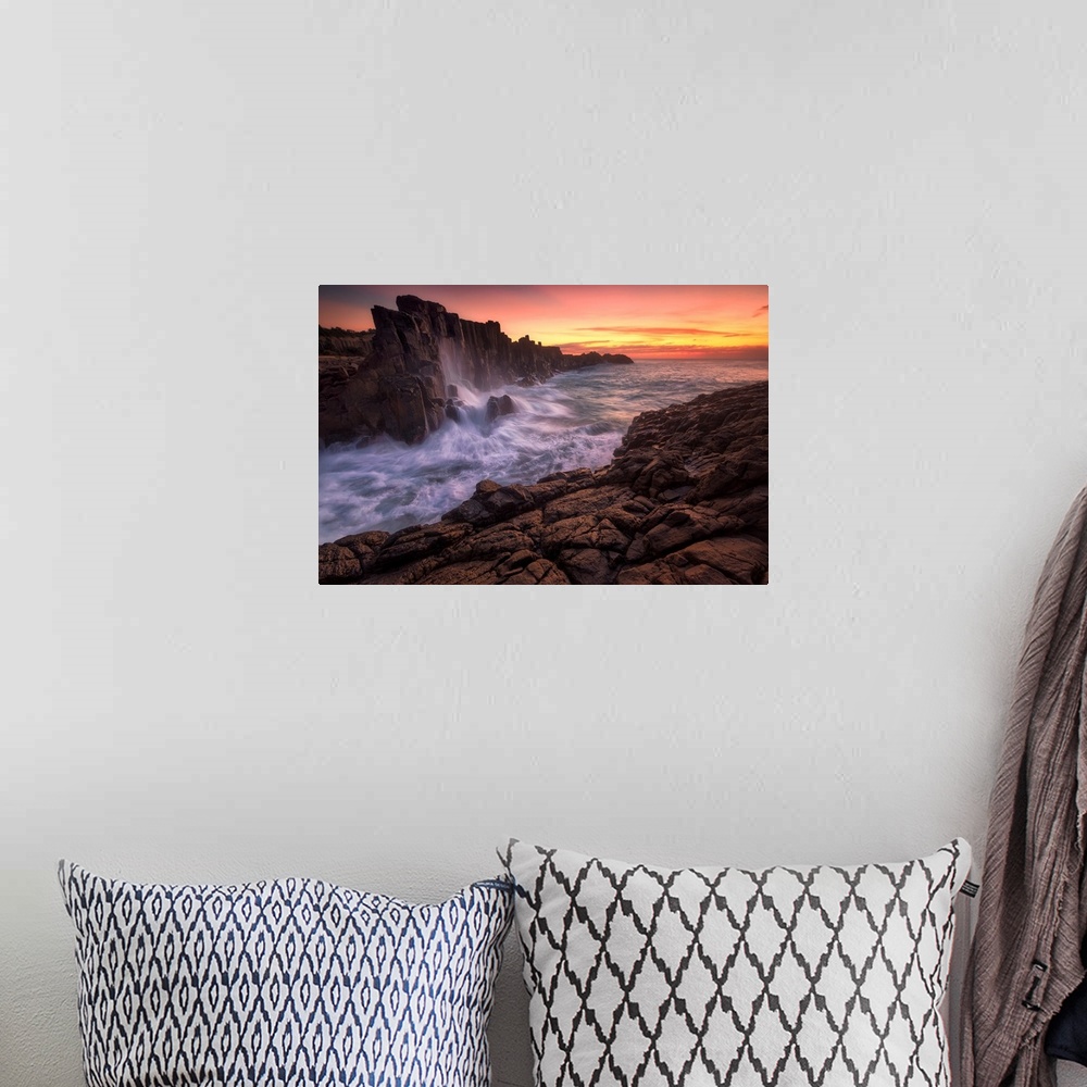 A bohemian room featuring Long exposure landscape photograph of rock formations with rushing water at sunrise, Kiama, Austr...
