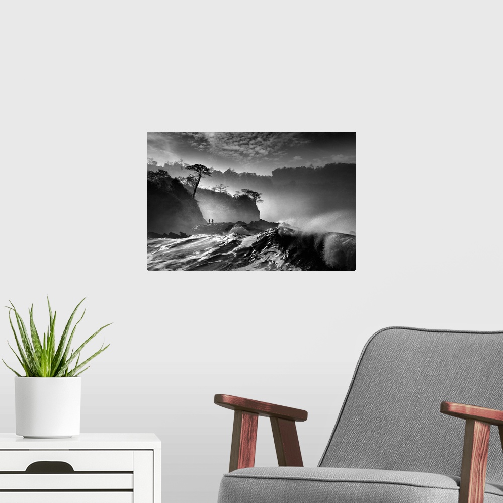 A modern room featuring Rushing river along the edge of a forest in the mist, in black and white.