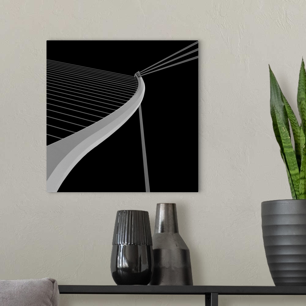 A modern room featuring Black and white architectural abstract photograph of leading lines on the Samuel Beckett Bridge i...