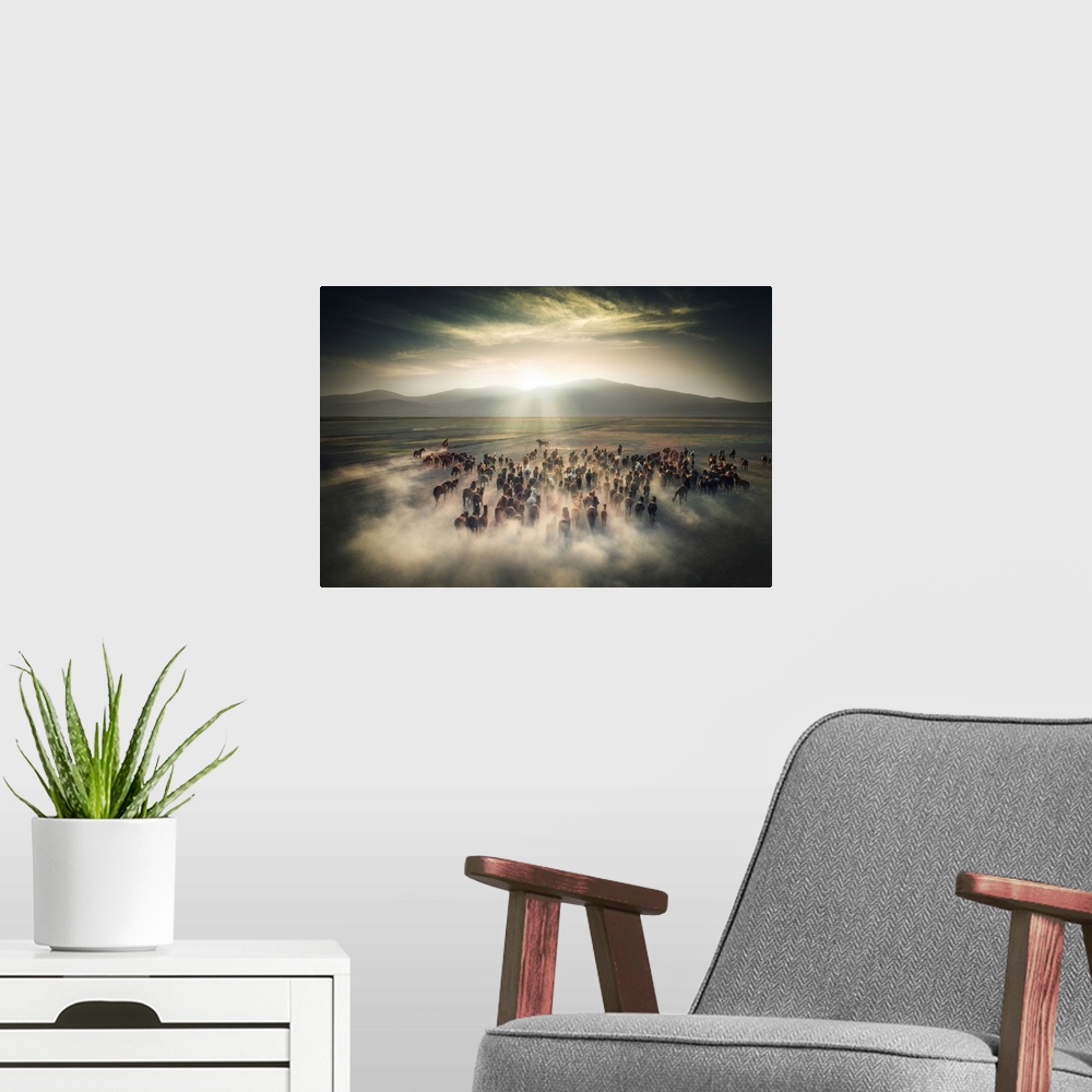 A modern room featuring A stunning fine art photograph of a herd of wild ponies out on a prairie. The rays of the sun ill...