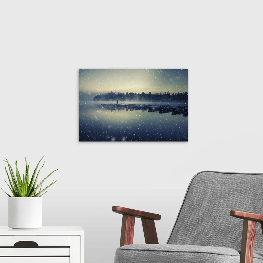 A modern room featuring Landscape photograph of a row of docked boats during a snow storm in Finland.