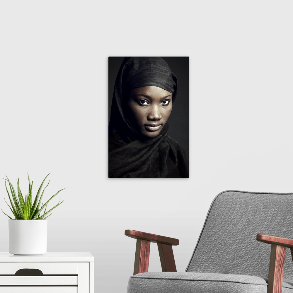 A modern room featuring Portrait of a beautiful woman wearing a black veil, Dakar, Senegal.