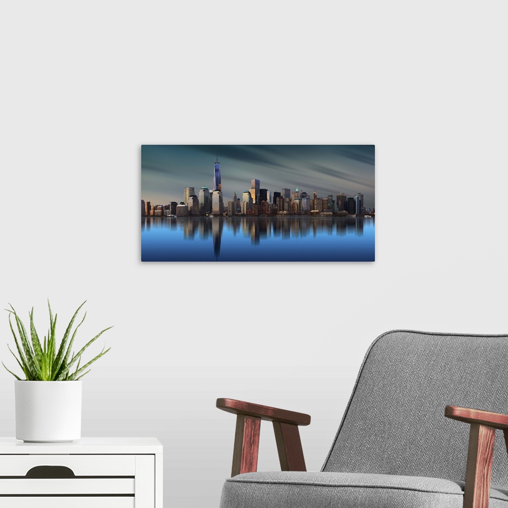 A modern room featuring Manhattan skyline with the One World Trade Center building standing tall.