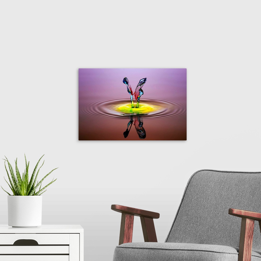 A modern room featuring A macro photograph of a colorful splash of a droplet of water.