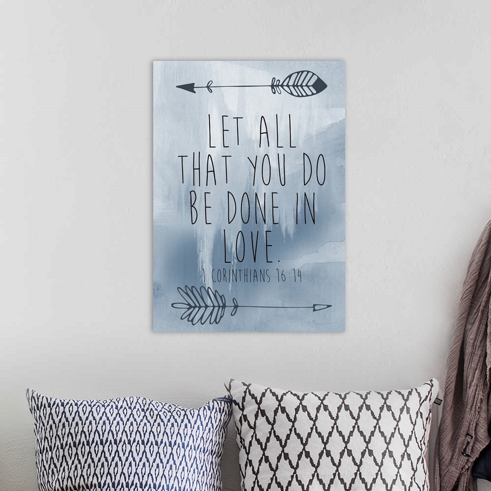 A bohemian room featuring Bible verse with a simple arrow motif over a blue watercolor wash.