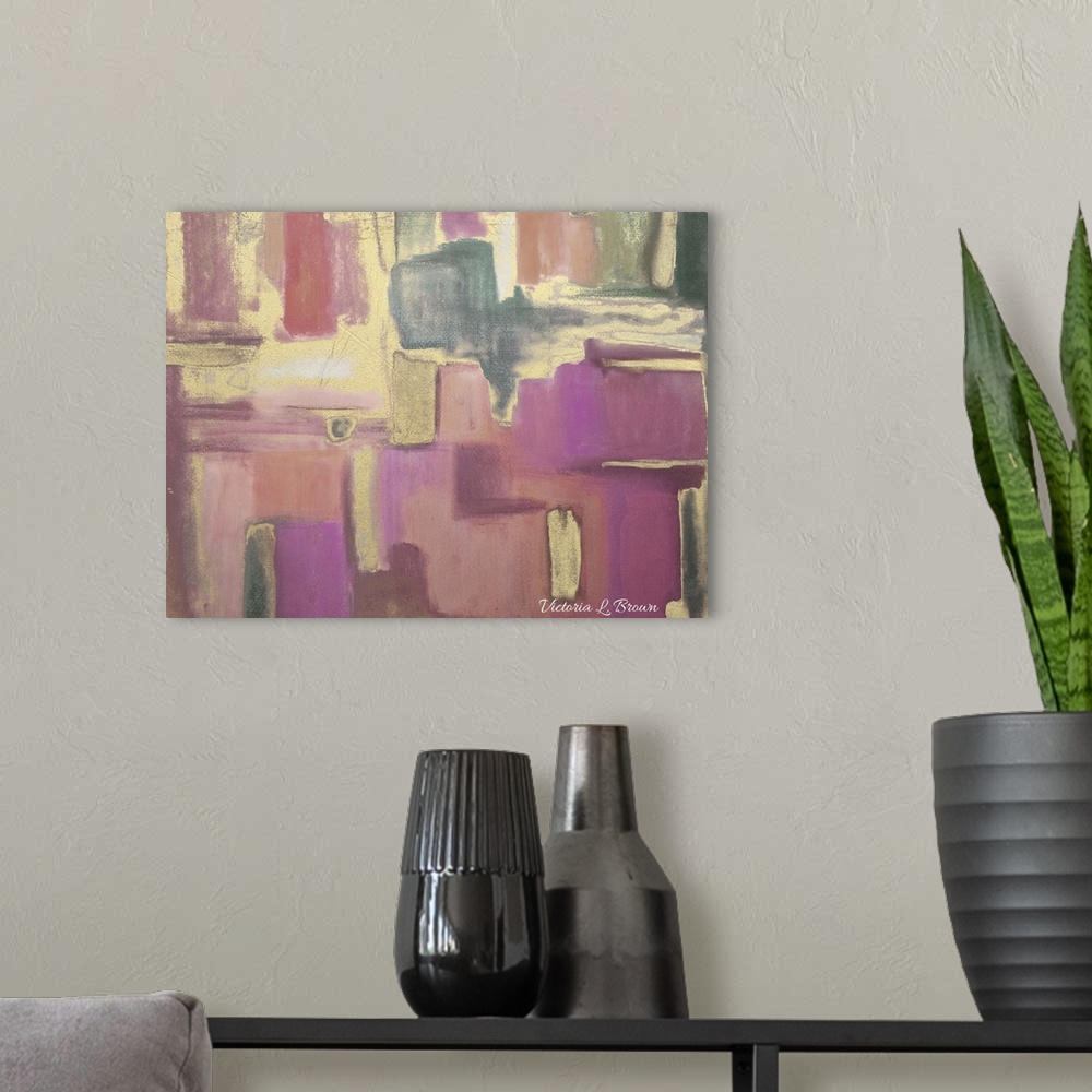 A modern room featuring Contemporary abstract home decor artwork using tones of pink and gold.