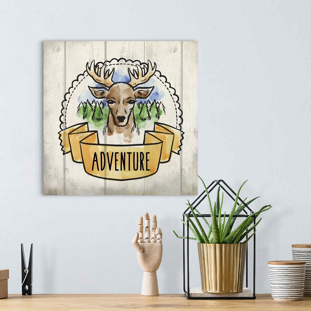 A bohemian room featuring Wanderlust themed design with a banner reading "Adventure" and a deer portrait.