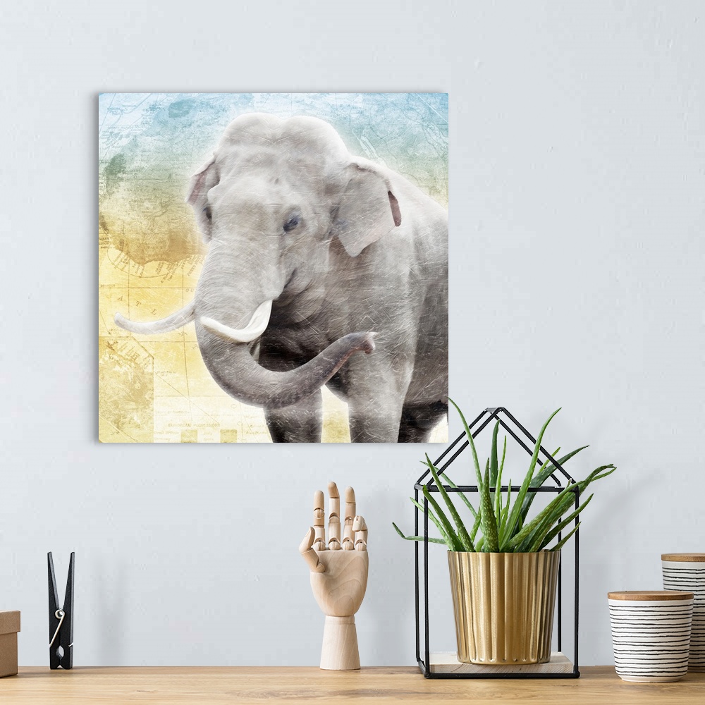 A bohemian room featuring A heavily textured painting of an elephant on top of a map of Africa with cool tones at the top f...