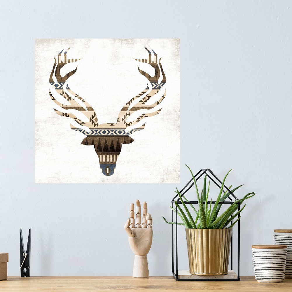 A bohemian room featuring A deer silhouette with geometric patterns.
