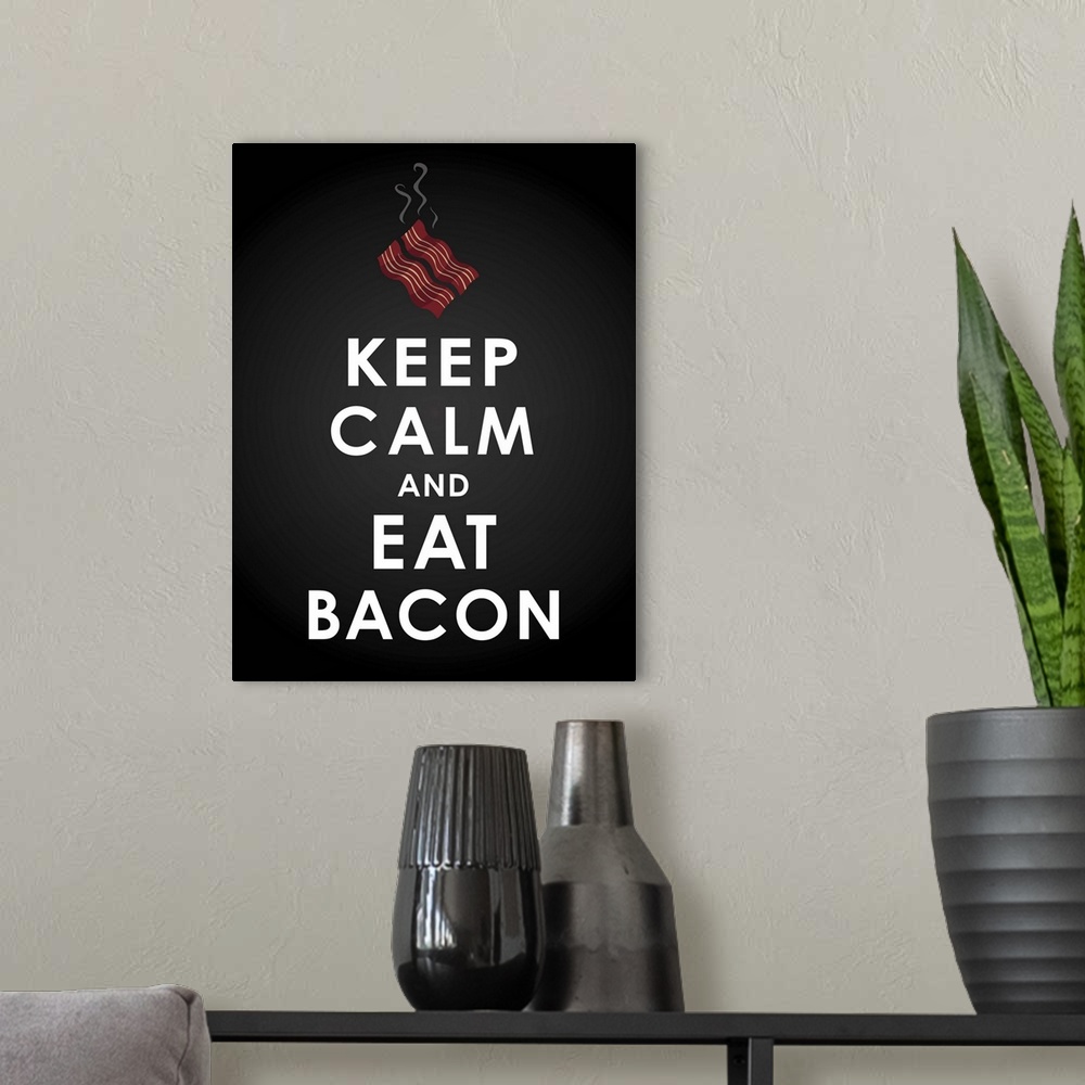 A modern room featuring Kitchen decor art depicting sizzling bacon with the text "Keep calm and eat bacon" underneath, on...