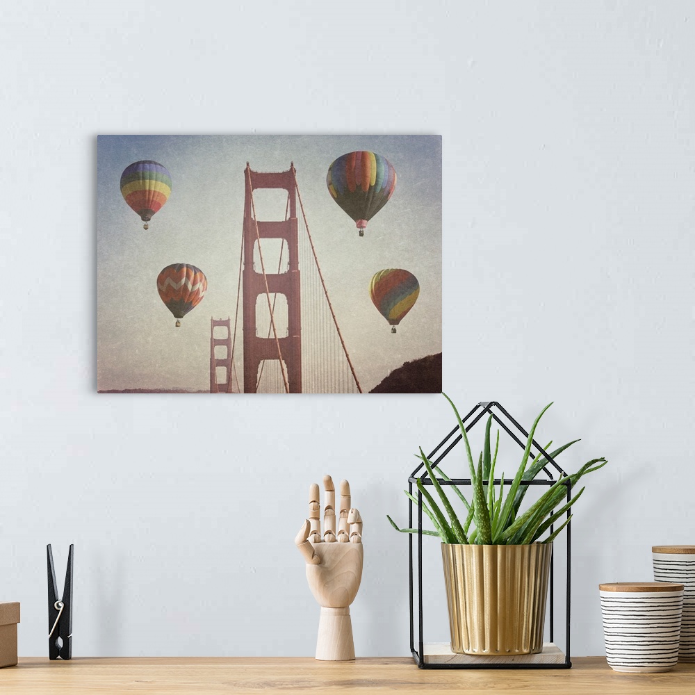 A bohemian room featuring Artistically filtered photograph of the golden gate bridge surrounded by hot air balloons.