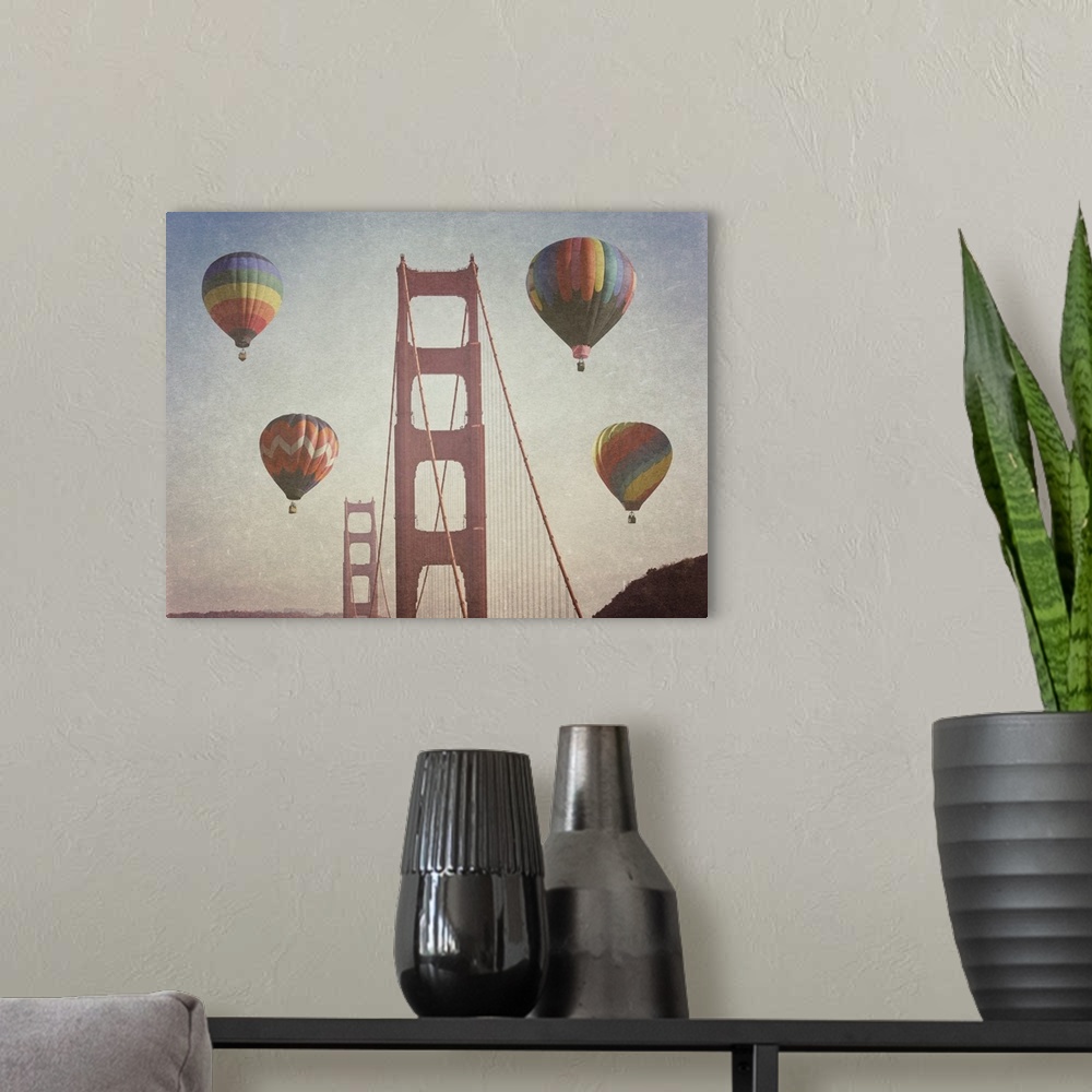 A modern room featuring Artistically filtered photograph of the golden gate bridge surrounded by hot air balloons.