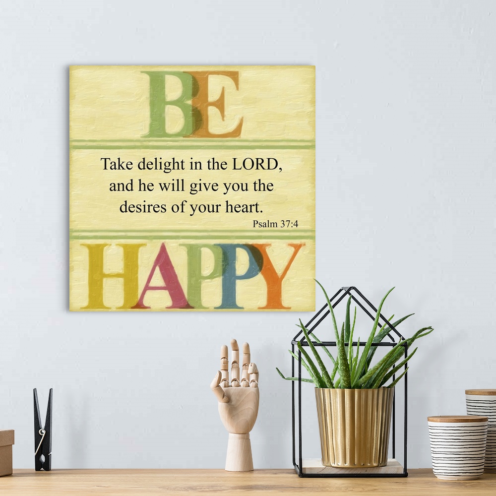 A bohemian room featuring Bible verse Psalm 37:4 framed by letters in rainbow colors.
