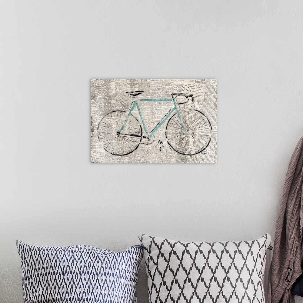 A bohemian room featuring Image of a bicycle on weathered news print.