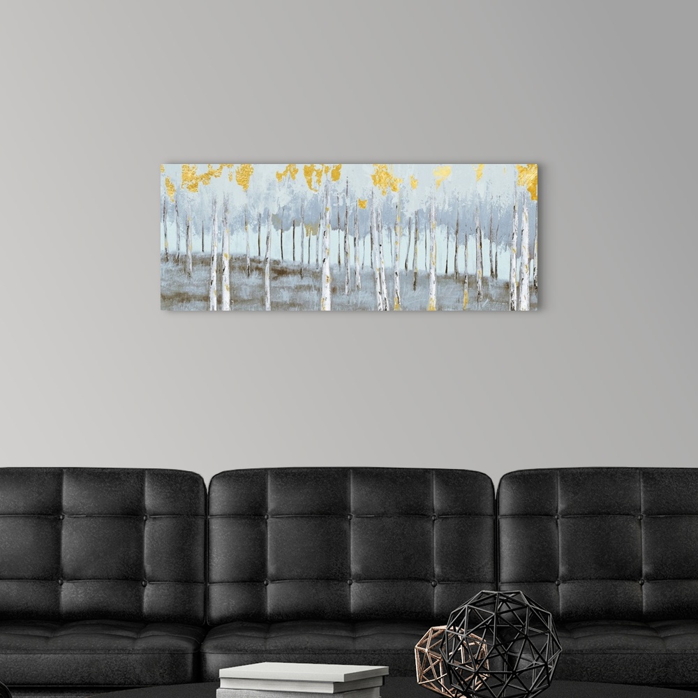 A modern room featuring Contemporary painting of a grove of grey birch trees with bright gold leaves.