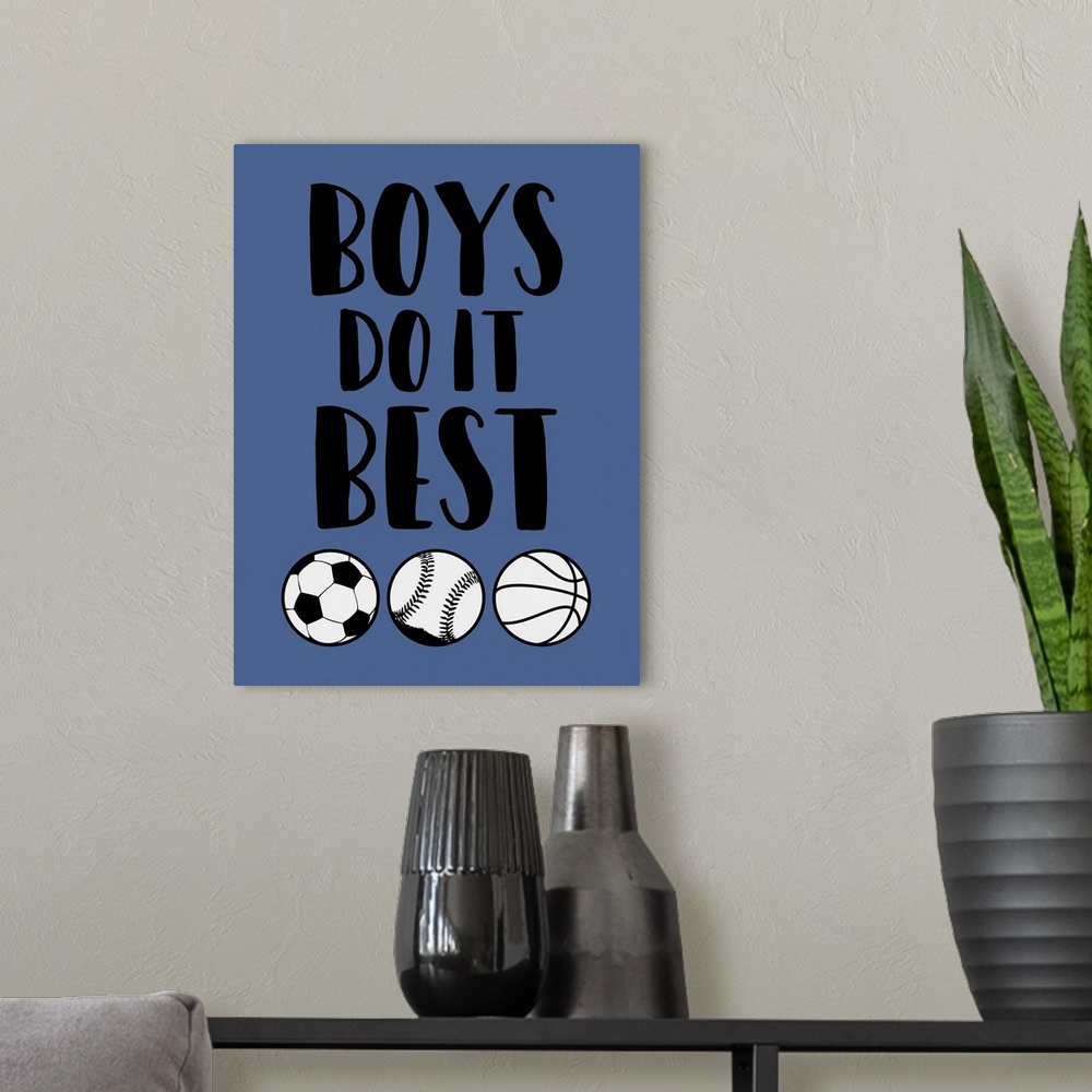 A modern room featuring Boy's room themed artwork with a soccer ball, baseball, and basketball design.