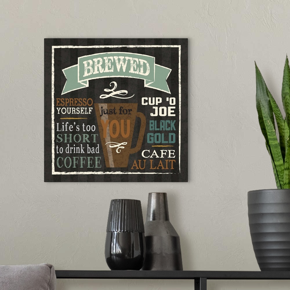 A modern room featuring Chalkboard style artwork featuring a  mug of coffee and coffee-related phrases.