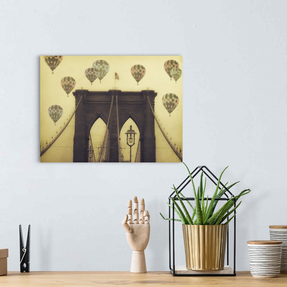 A bohemian room featuring Weathered photograph of the top of the Brooklyn Bridge, with hot air balloons in the background.