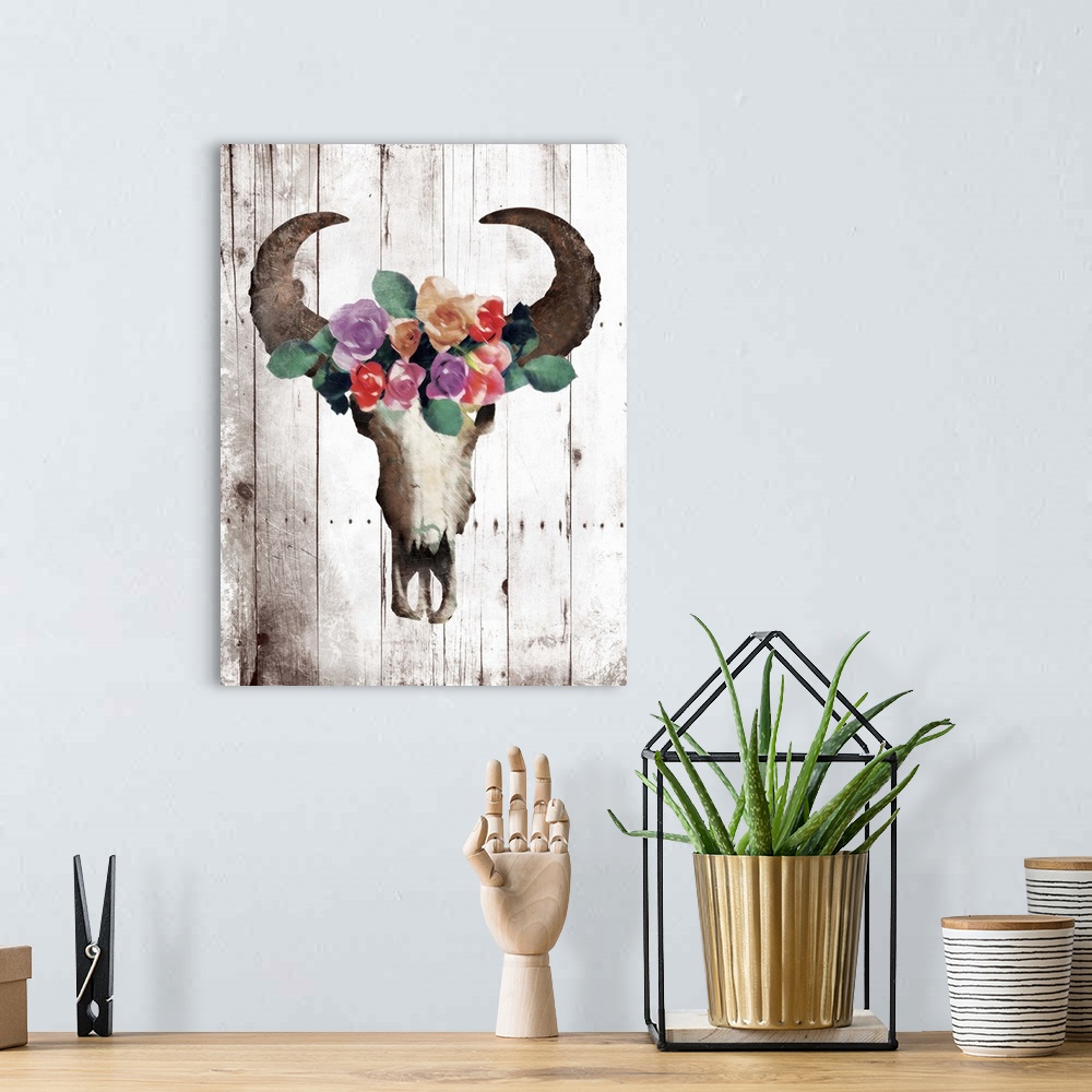 A bohemian room featuring A painting of a bull skull wearing a crown made out of flowers on a wood panel background.