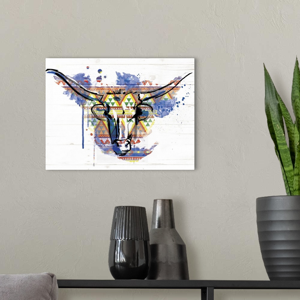A modern room featuring A black outline of a bull?s head with a colorful, paint splatter and geometric shaped pattern bac...