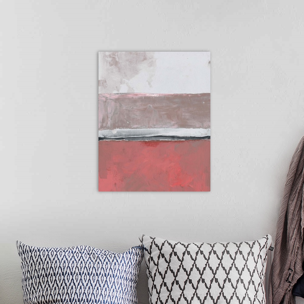 A bohemian room featuring Abstract color block artwork in shades of coral pink and pale grey.