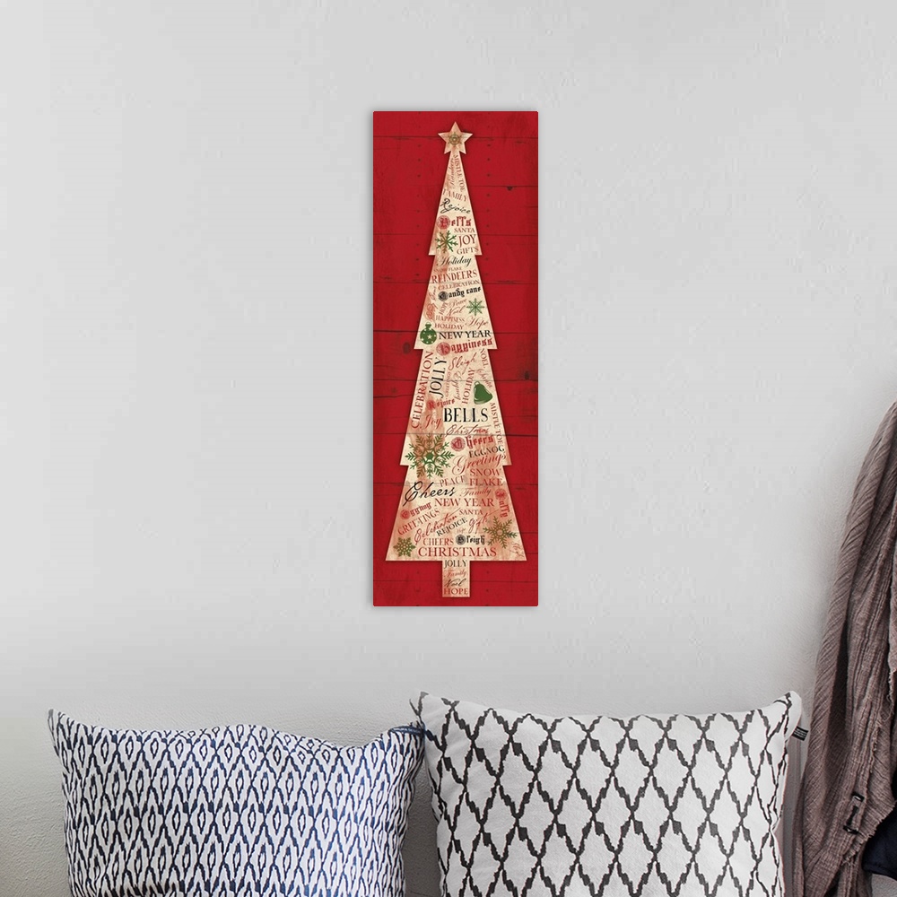 A bohemian room featuring Seasonal artwork of Christmas tree made of articles of newsprint against red background.