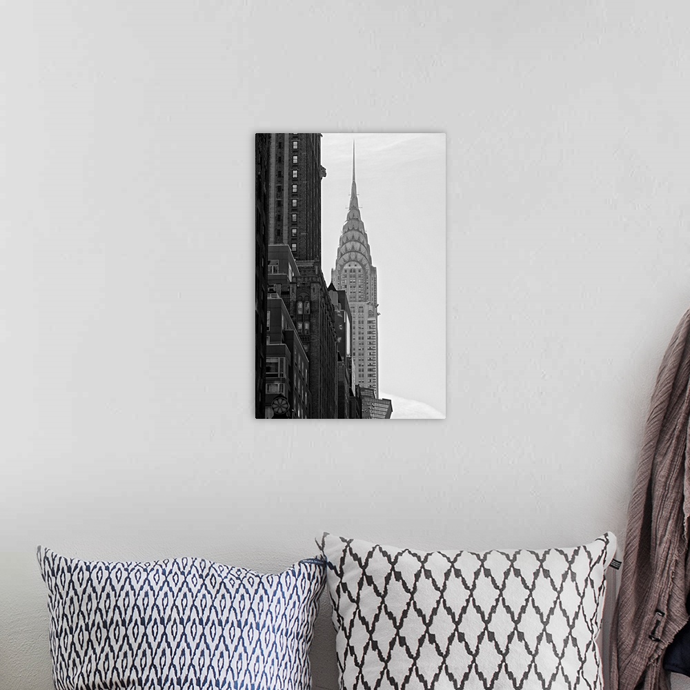 A bohemian room featuring Black and white photograph of the Chrysler building in New York City