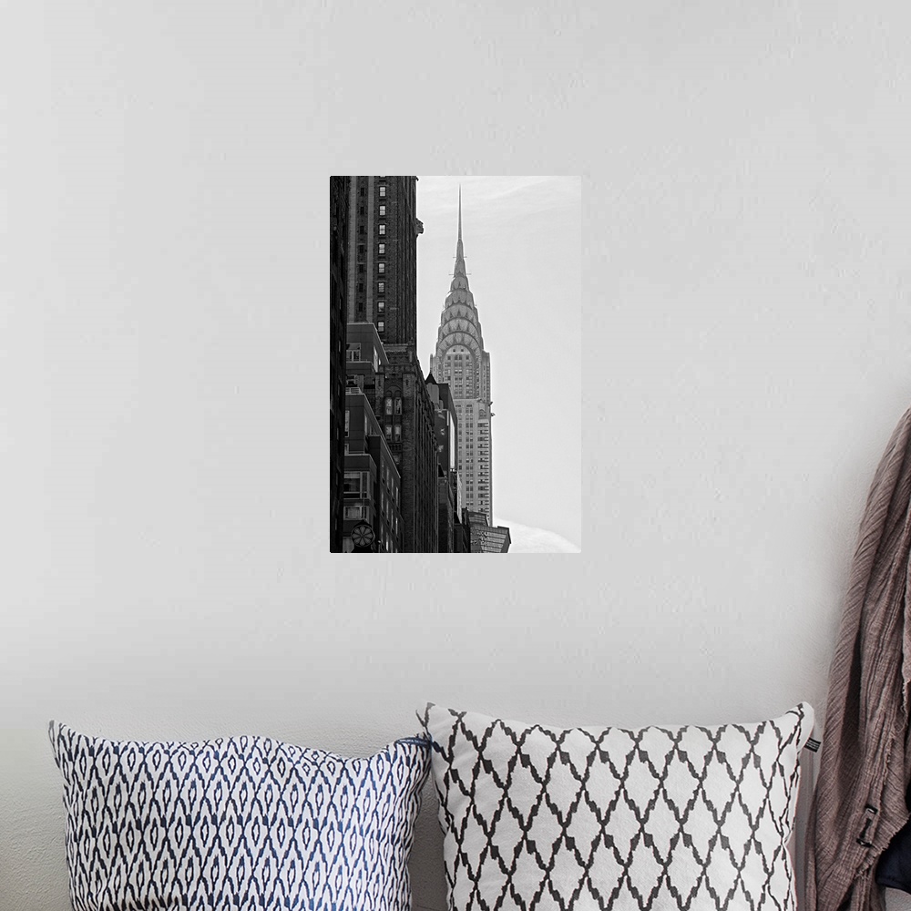 A bohemian room featuring Black and white photograph of the Chrysler building in New York City
